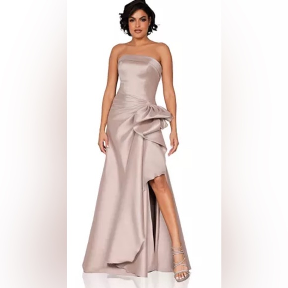 Dress is size 10, but fits a size 8. It was shortened to fit me.  I am 5’2 . - Picture 2 of 2